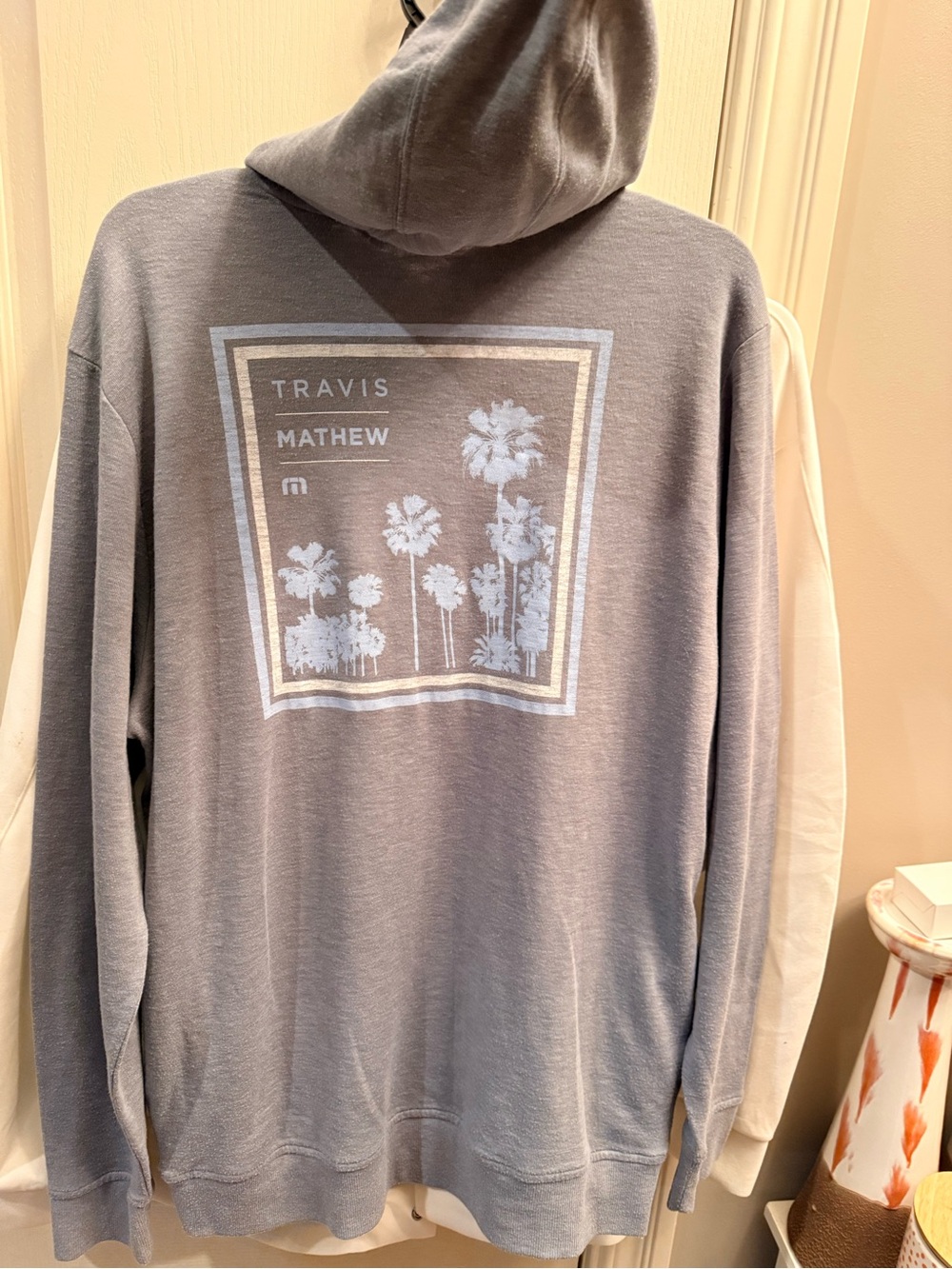 Travis Mathew Men's blue/gray Hoodie with Palm Graphic. Size large